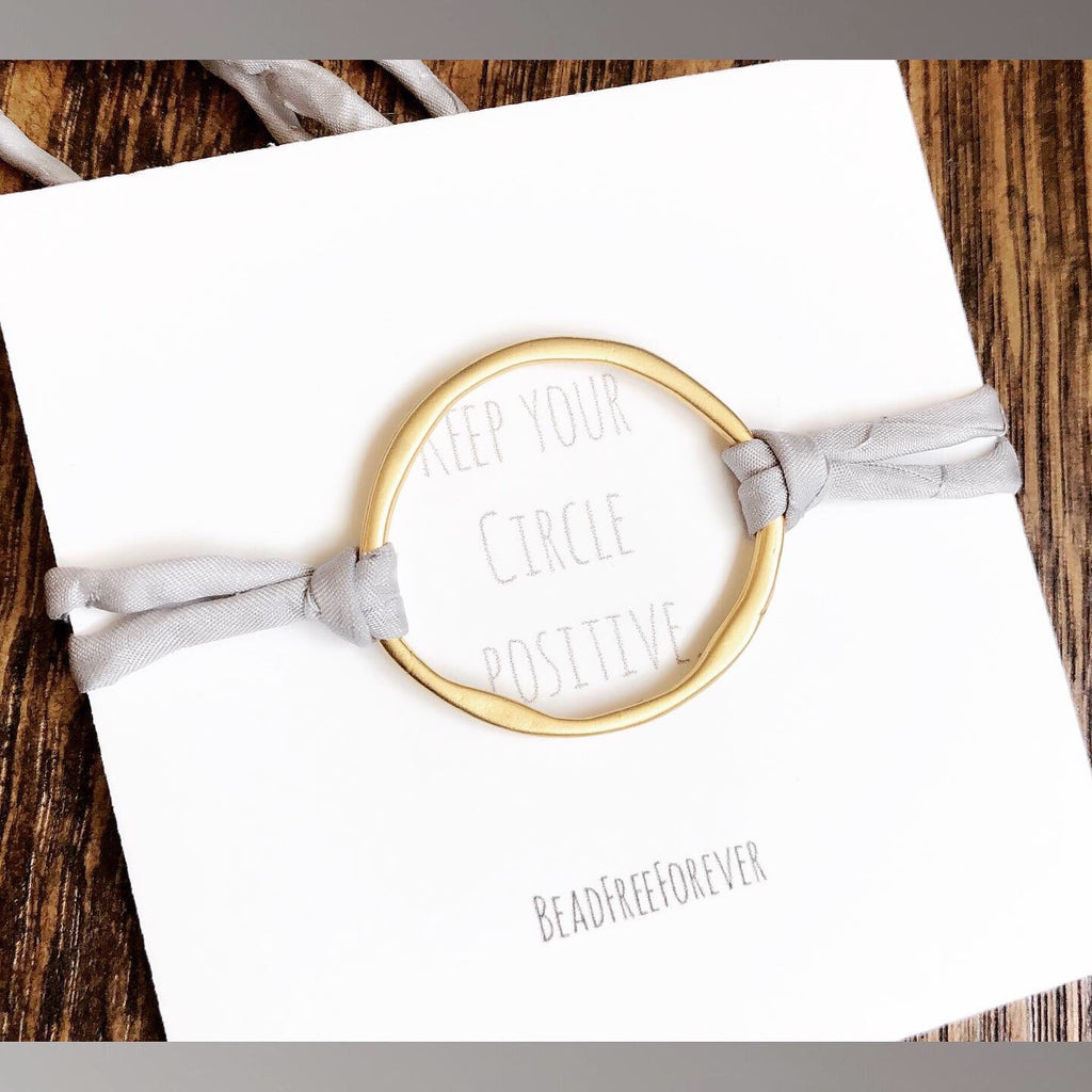 ‘Keep your circle positive’ silk adjustable bracelet